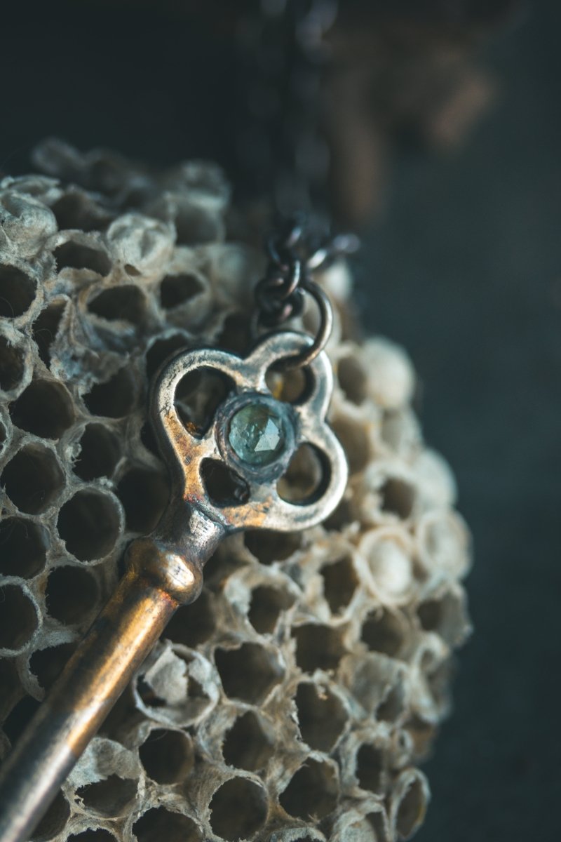 Hekate's Crossroads Key with Pale Green Emerald: Handcrafted Pendant of Transformation and Protection - Machinations