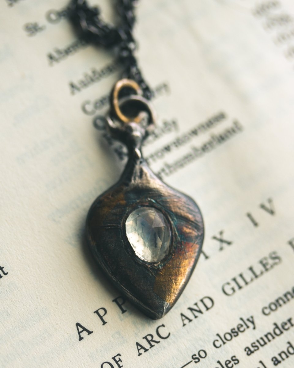 Ancient Echoes Amulet with Moonstone: Handcrafted Silver Amulets with 23.5K Gold Accents - Machinations
