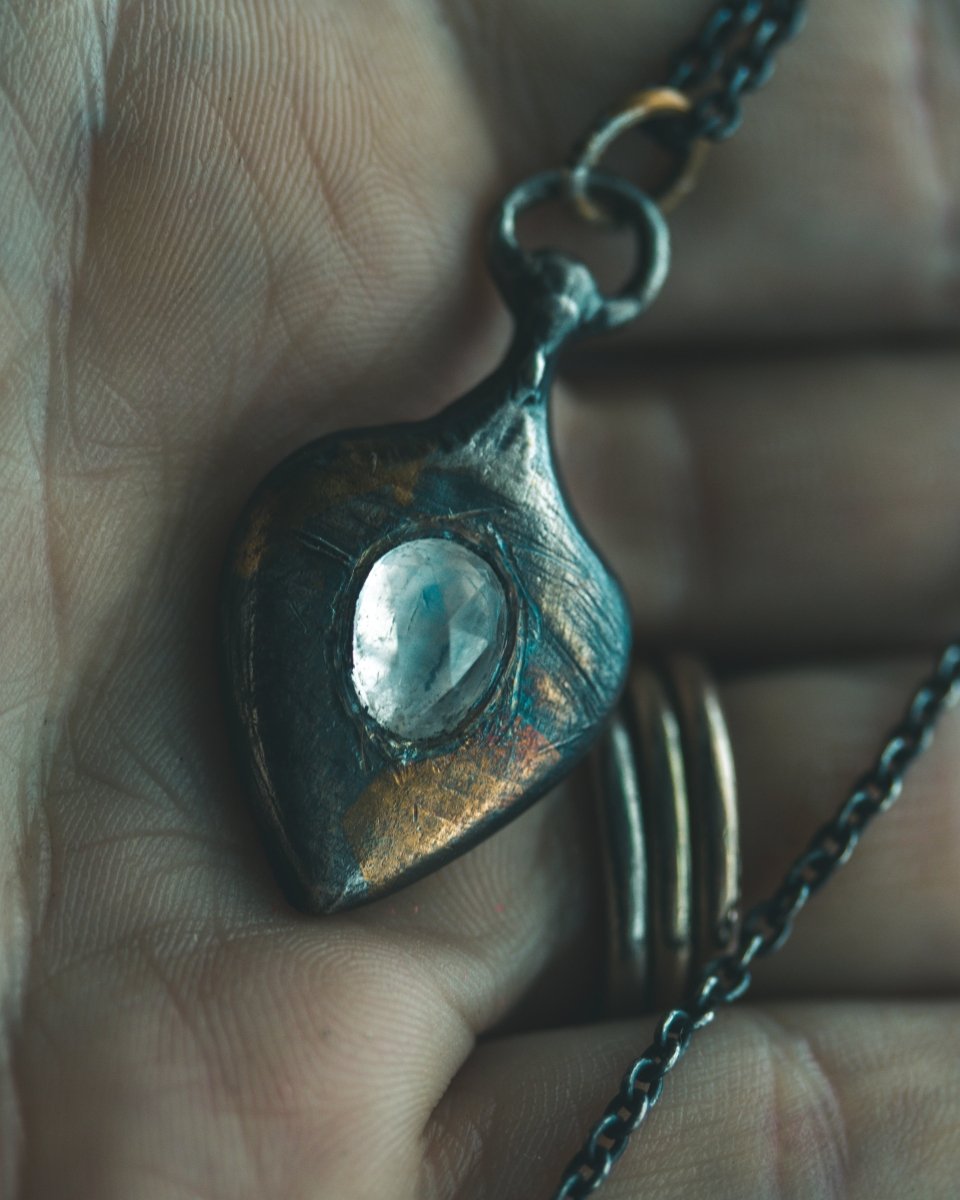 Ancient Echoes Amulet with Moonstone: Handcrafted Silver Amulets with 23.5K Gold Accents - Machinations