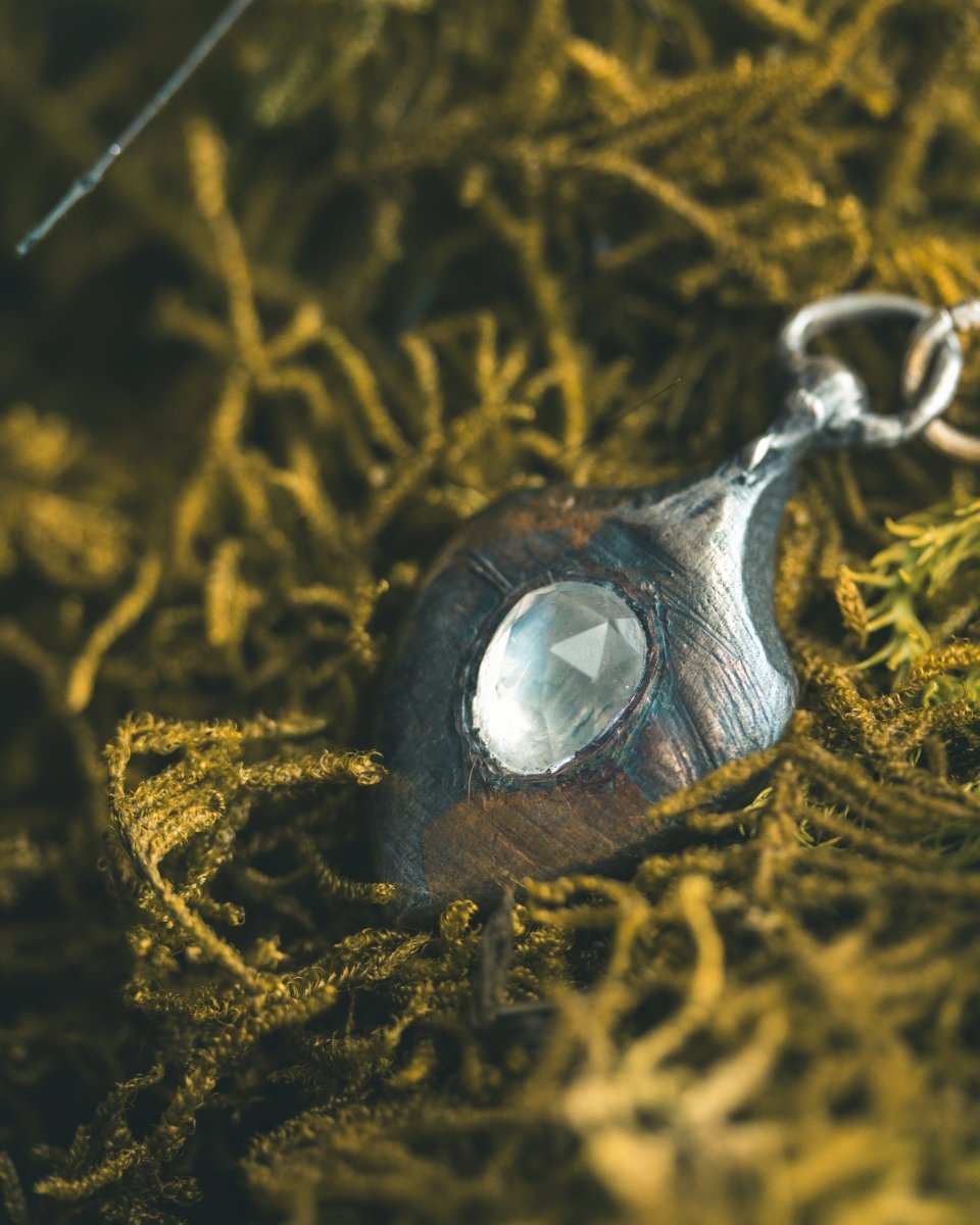 Ancient Echoes Amulet with Moonstone: Handcrafted Silver Amulets with 23.5K Gold Accents - Machinations