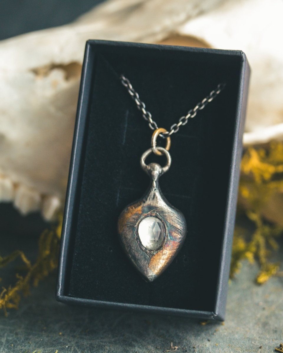 Ancient Echoes Amulet with Moonstone: Handcrafted Silver Amulets with 23.5K Gold Accents - Machinations
