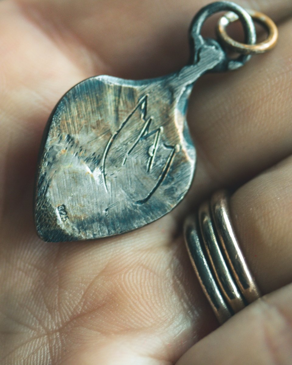 Ancient Echoes Amulet with Moonstone: Handcrafted Silver Amulets with 23.5K Gold Accents - Machinations