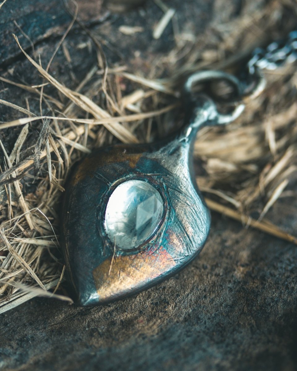 Ancient Echoes Amulet with Moonstone: Handcrafted Silver Amulets with 23.5K Gold Accents - Machinations