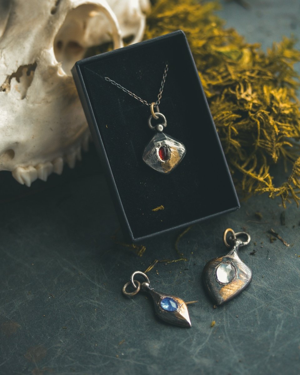 Ancient Echoes Amulet with Moonstone: Handcrafted Silver Amulets with 23.5K Gold Accents - Machinations