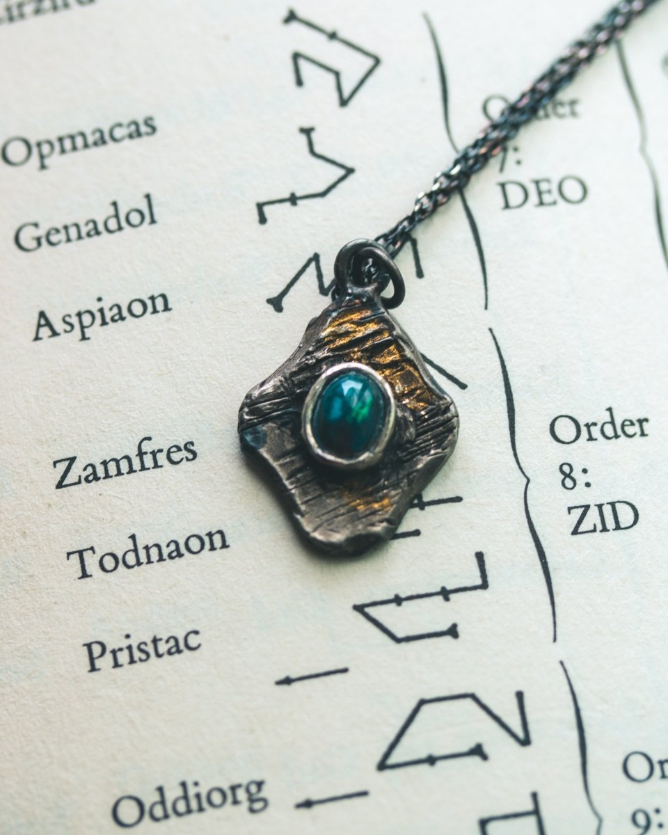 Beyond the Vale Amulets: Black Opal – A Talisman of Mystery and Transformation - Machinations