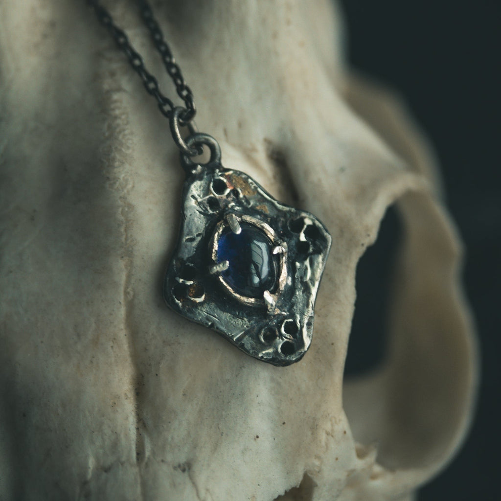 Beyond the vale iolite cabochon Amulets - Machinations