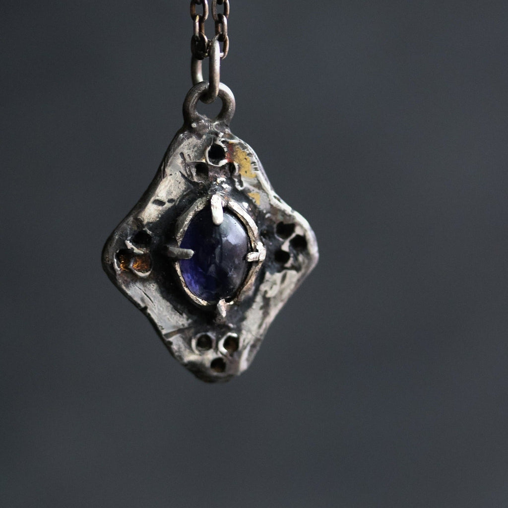 Beyond the vale iolite cabochon Amulets - Machinations