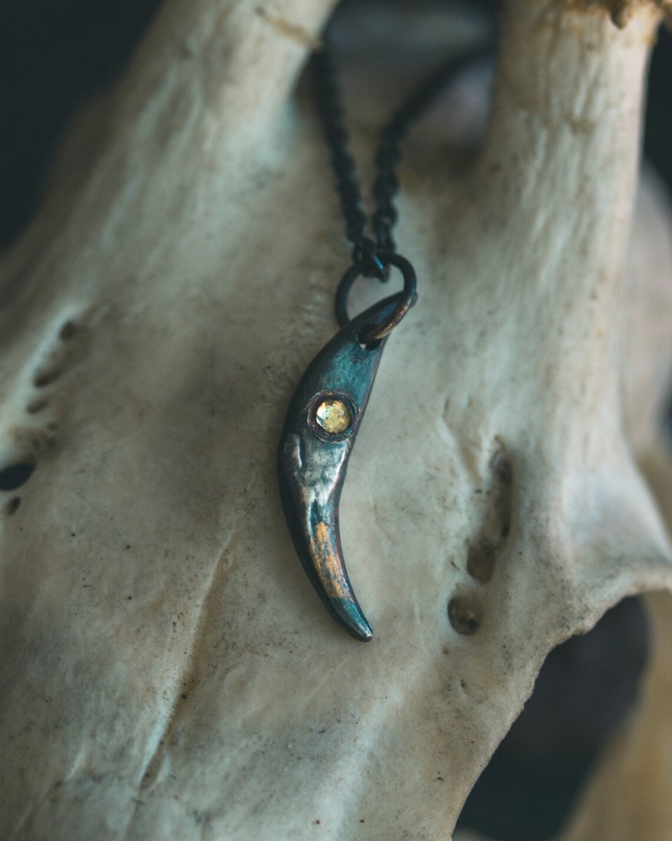 Fox Fang Pendant with Rose - Cut Peridot: A Symbol of Cunning, Growth, and Renewal - Machinations