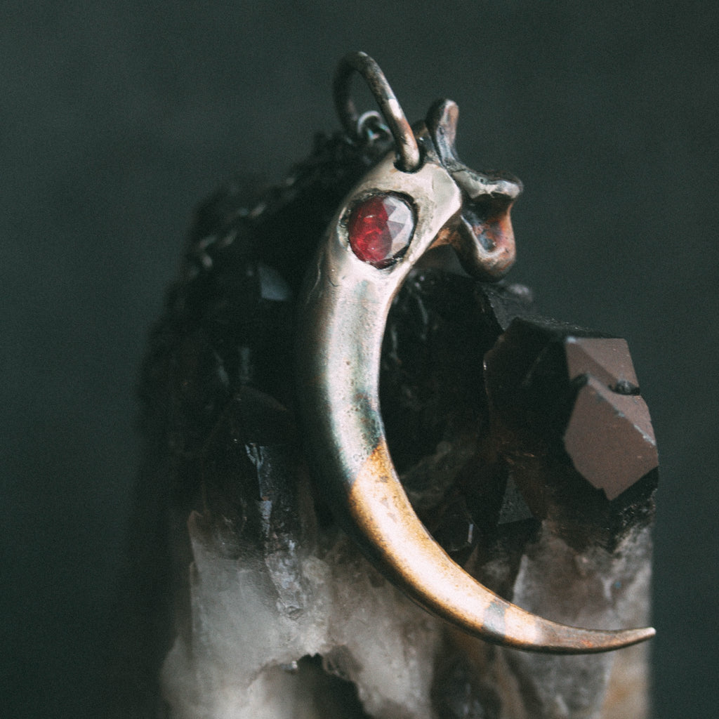 Golden Eagle Talon With Garnet - Machinations