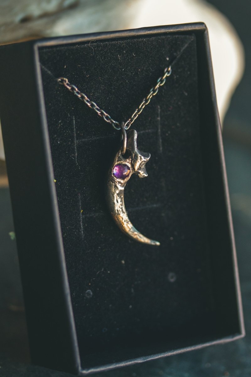 Great Horned Owl Talon Pendant with Amethyst: A Symbol of Wisdom and Power - Machinations