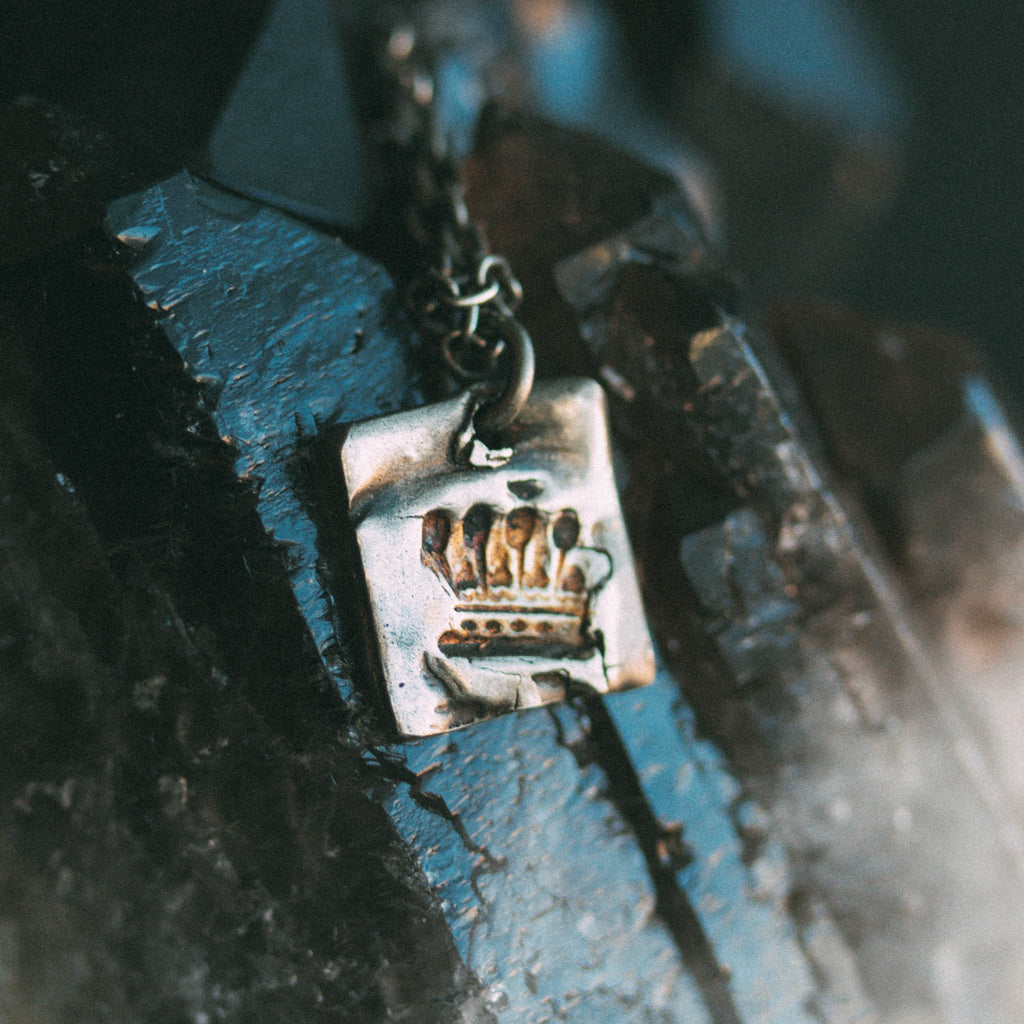 Illuminated Crown Tag Necklace - Machinations