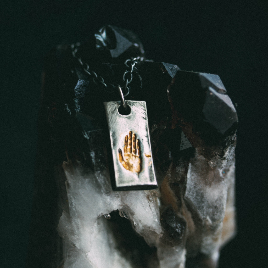 Illuminated Hand Tag Necklace - Machinations