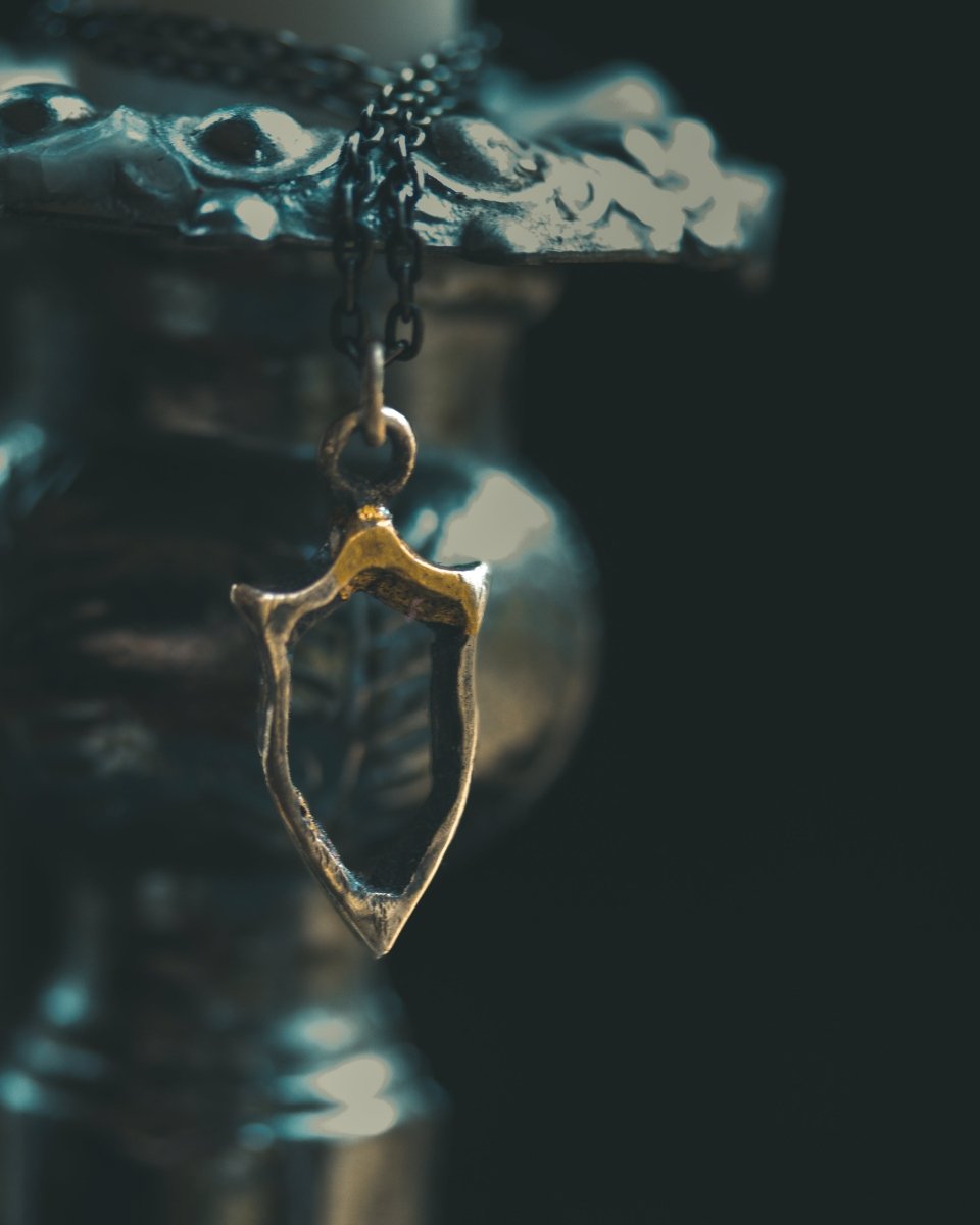 Knights Collection - Hollow Shield Charm | Sterling Silver & 23.5K Gold | Medieval Pilgrimage Token - Machinations