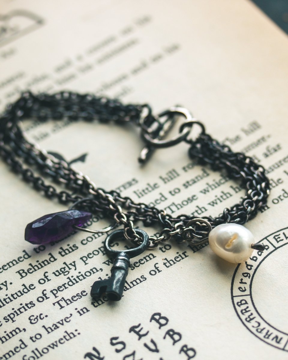 Limited Edition Amethyst Bead Key Charm Bracelet: A Talisman of Wisdom, Protection, and Purity - Machinations