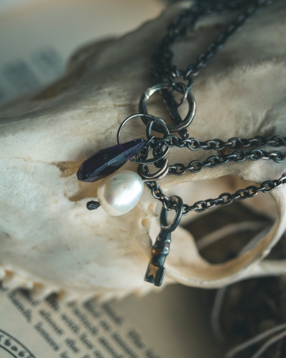 Limited Edition Amethyst Bead Key Charm Bracelet: A Talisman of Wisdom, Protection, and Purity - Machinations