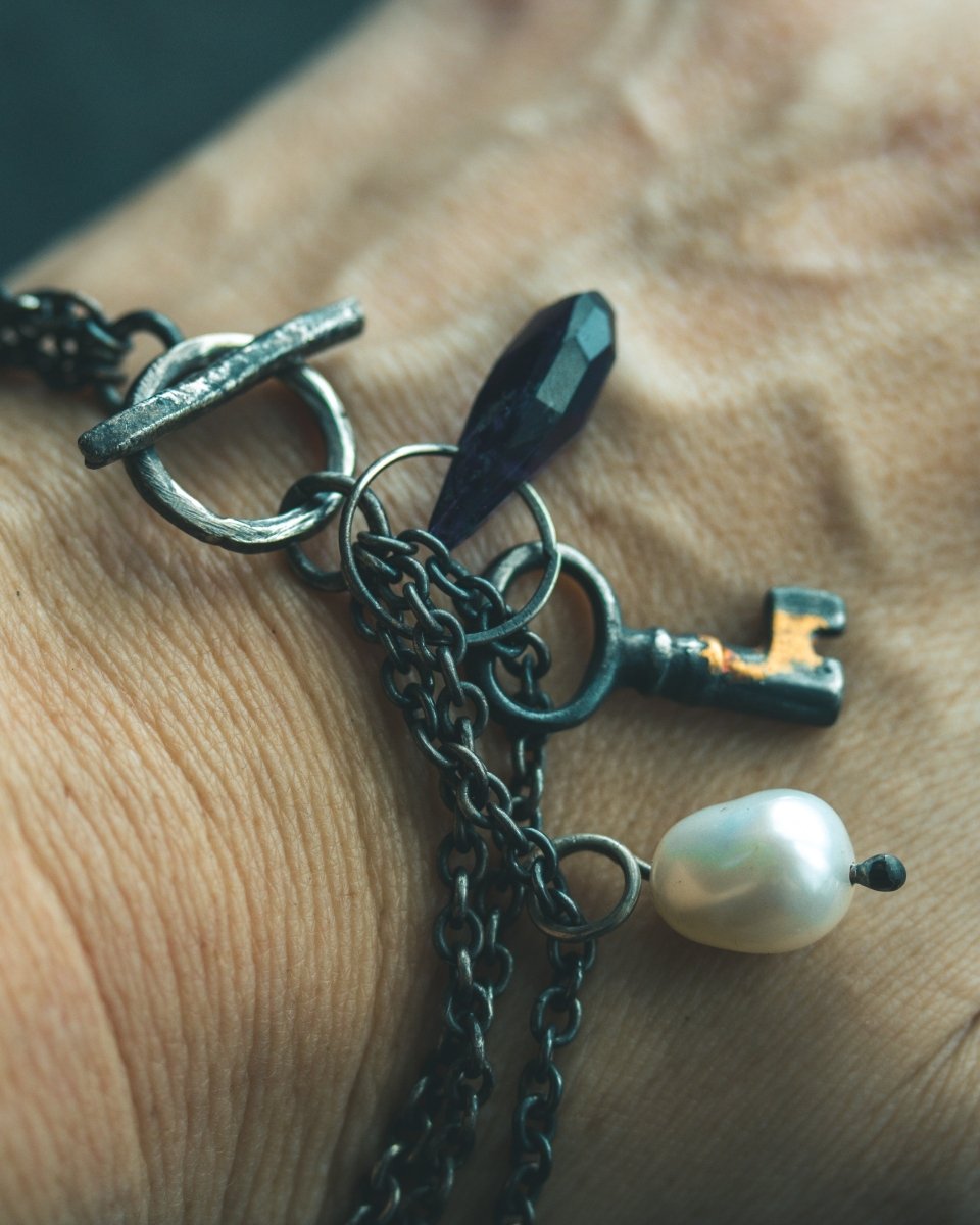 Limited Edition Amethyst Bead Key Charm Bracelet: A Talisman of Wisdom, Protection, and Purity - Machinations