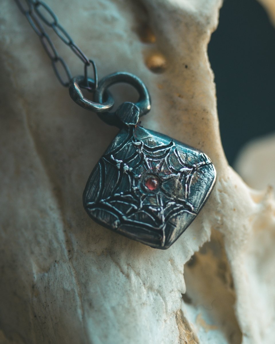 Limited Edition Arachne Myth Amulet with Almandine Garnet – A Symbol of Artistry and Transformation - Machinations
