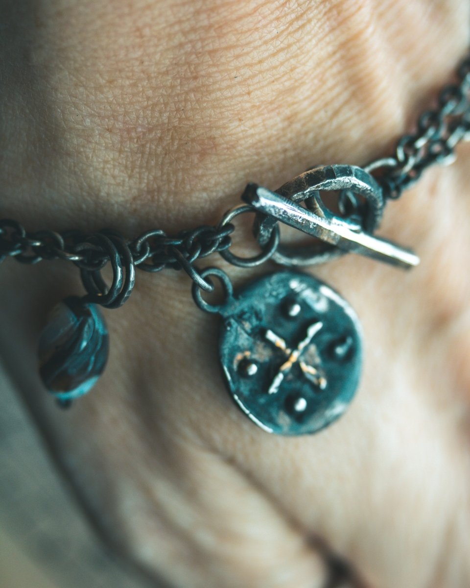 Limited Edition Charon Charm Bracelet: A Talisman of Guidance and Protection - Machinations