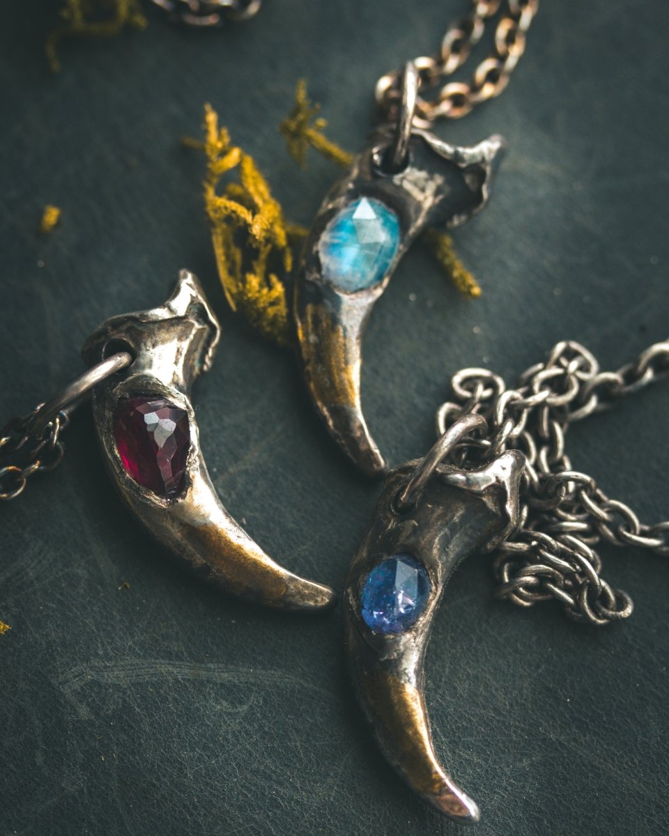 Lupus Spiritus Claw with Rhodolite Garnet: A Symbol of Guardianship, Loyalty, and Transformation - Machinations