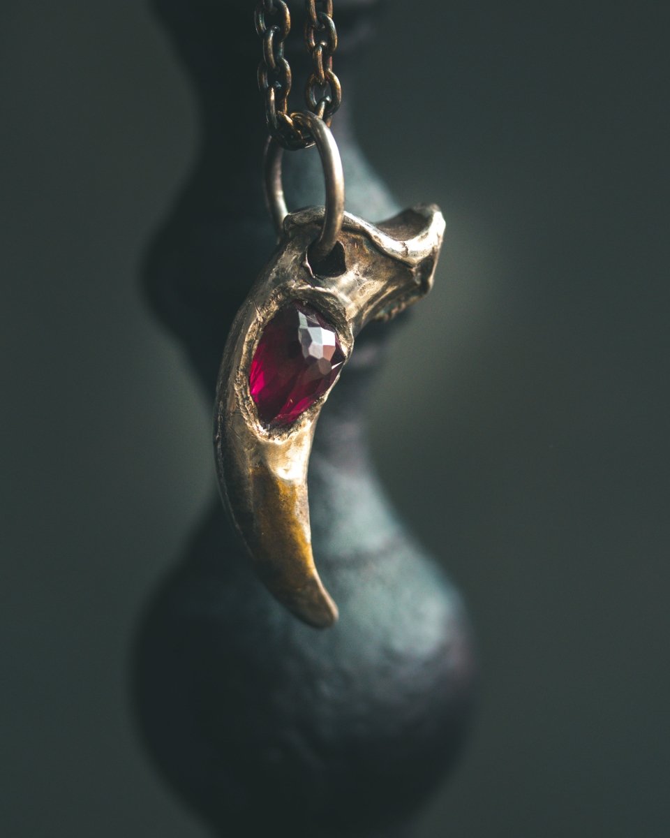 Lupus Spiritus Claw with Rhodolite Garnet: A Symbol of Guardianship, Loyalty, and Transformation - Machinations
