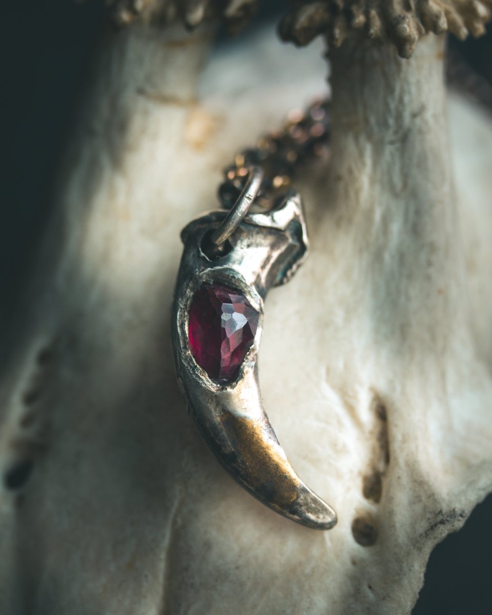 Lupus Spiritus Claw with Rhodolite Garnet: A Symbol of Guardianship, Loyalty, and Transformation - Machinations