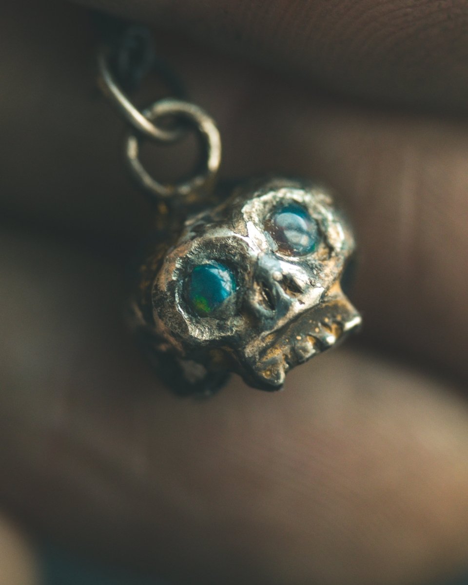 Memento Mori Skull Charm with Cabochon Black Opal – Sterling Silver & 23.5K Gold | Talisman of Life, Death and Cosmic Mystery - Machinations