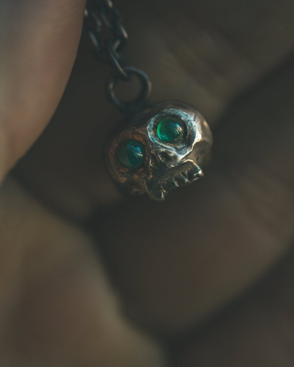 Memento Mori Skull Charm with Emerald Eyes – Sterling Silver & 23.5K Gold | Talisman of Life, Death, and Eternal Wisdom - Machinations
