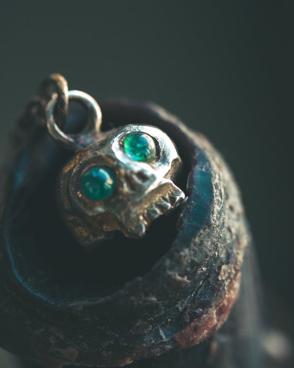 Memento Mori Skull Charm with Emerald Eyes – Sterling Silver & 23.5K Gold | Talisman of Life, Death, and Eternal Wisdom - Machinations