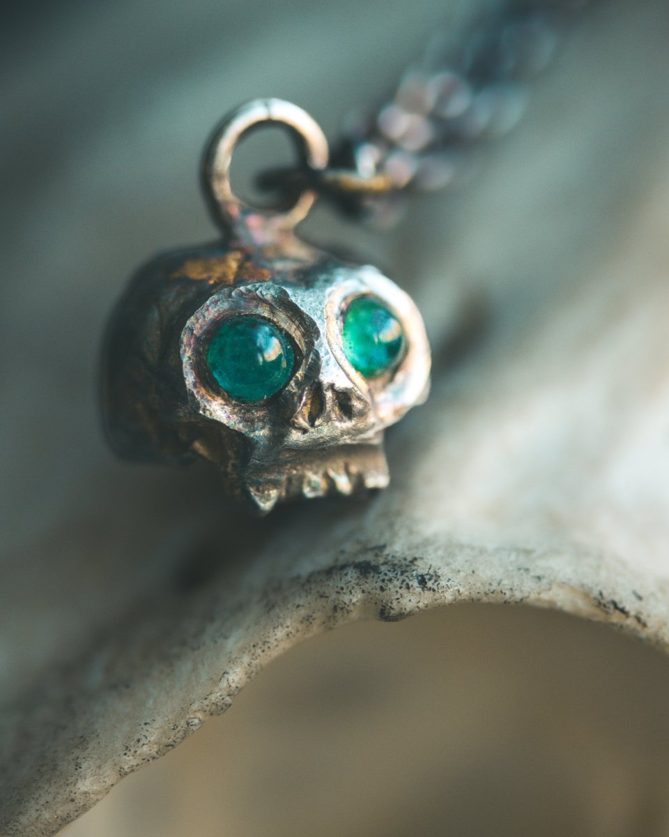 Memento Mori Skull Charm with Emerald Eyes – Sterling Silver & 23.5K Gold | Talisman of Life, Death, and Eternal Wisdom - Machinations