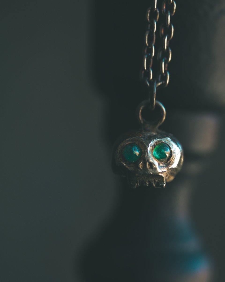 Memento Mori Skull Charm with Emerald Eyes – Sterling Silver & 23.5K Gold | Talisman of Life, Death, and Eternal Wisdom - Machinations