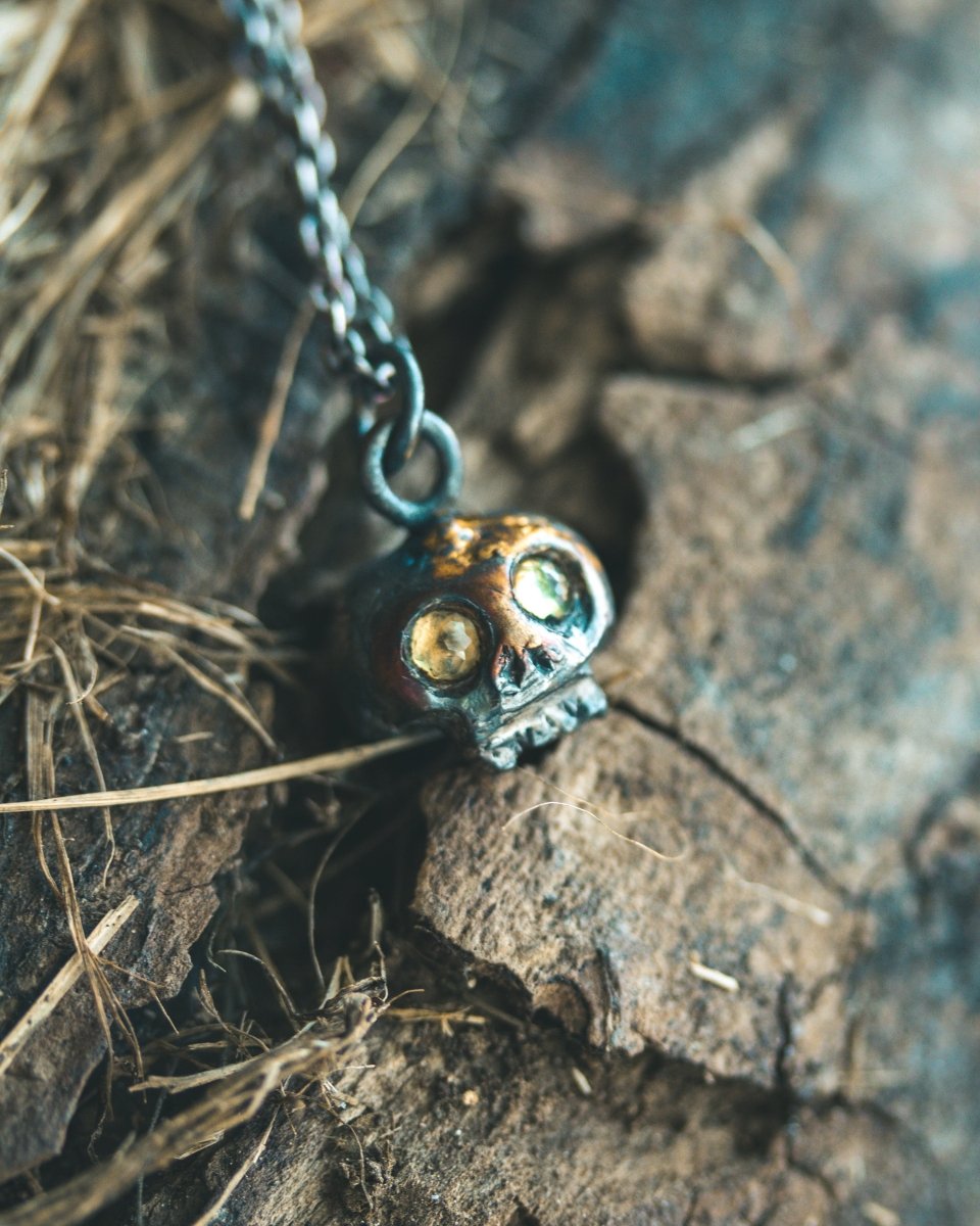 Memento Mori Skull Charm with Peridot Eyes: A Reflection of Life’s Duality - Machinations