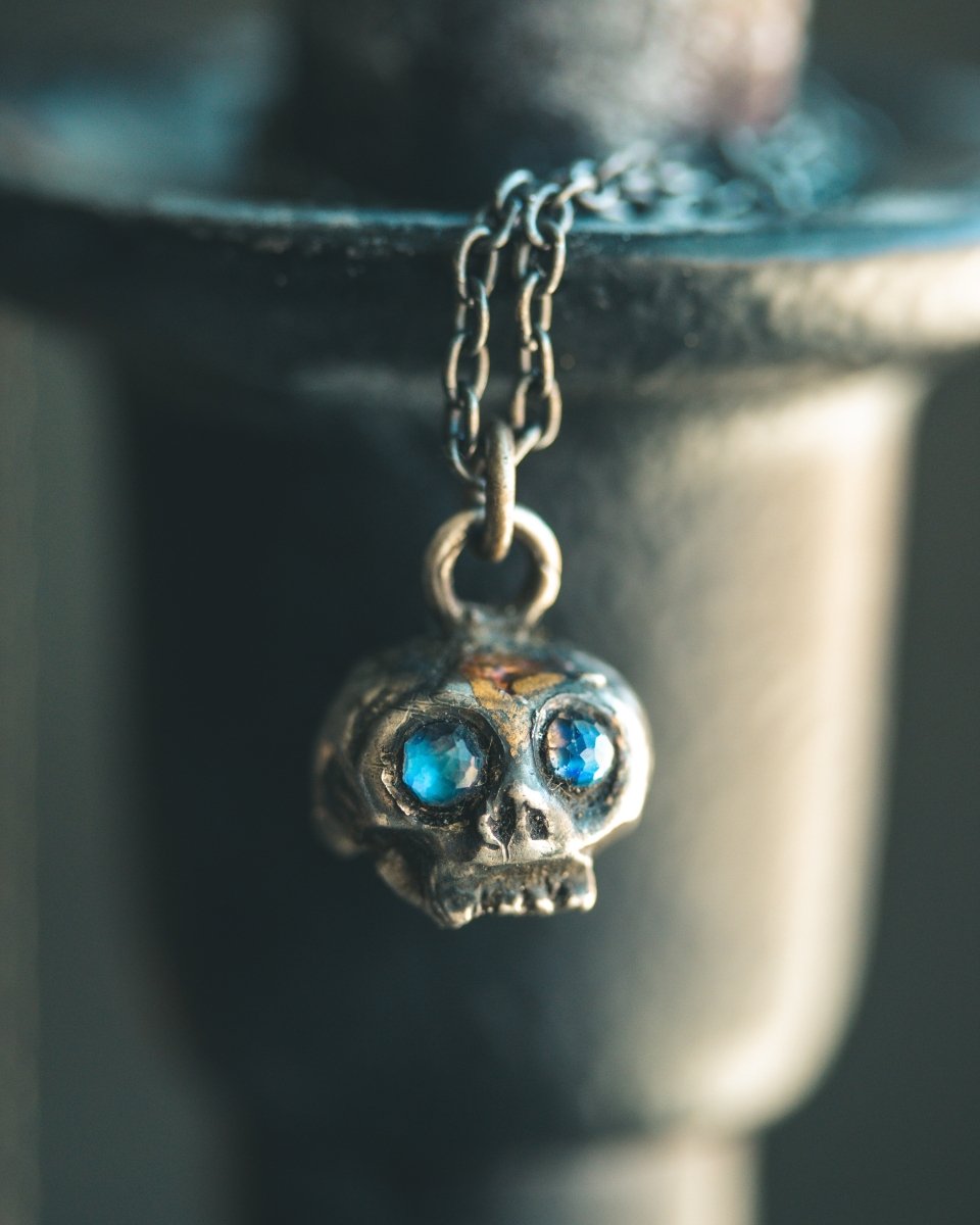 Memento Mori Skull Charm with Rose - Cut Rainbow Moonstone – Sterling Silver & 23.5K Gold | Talisman of Life, Death and Inner Light - Machinations