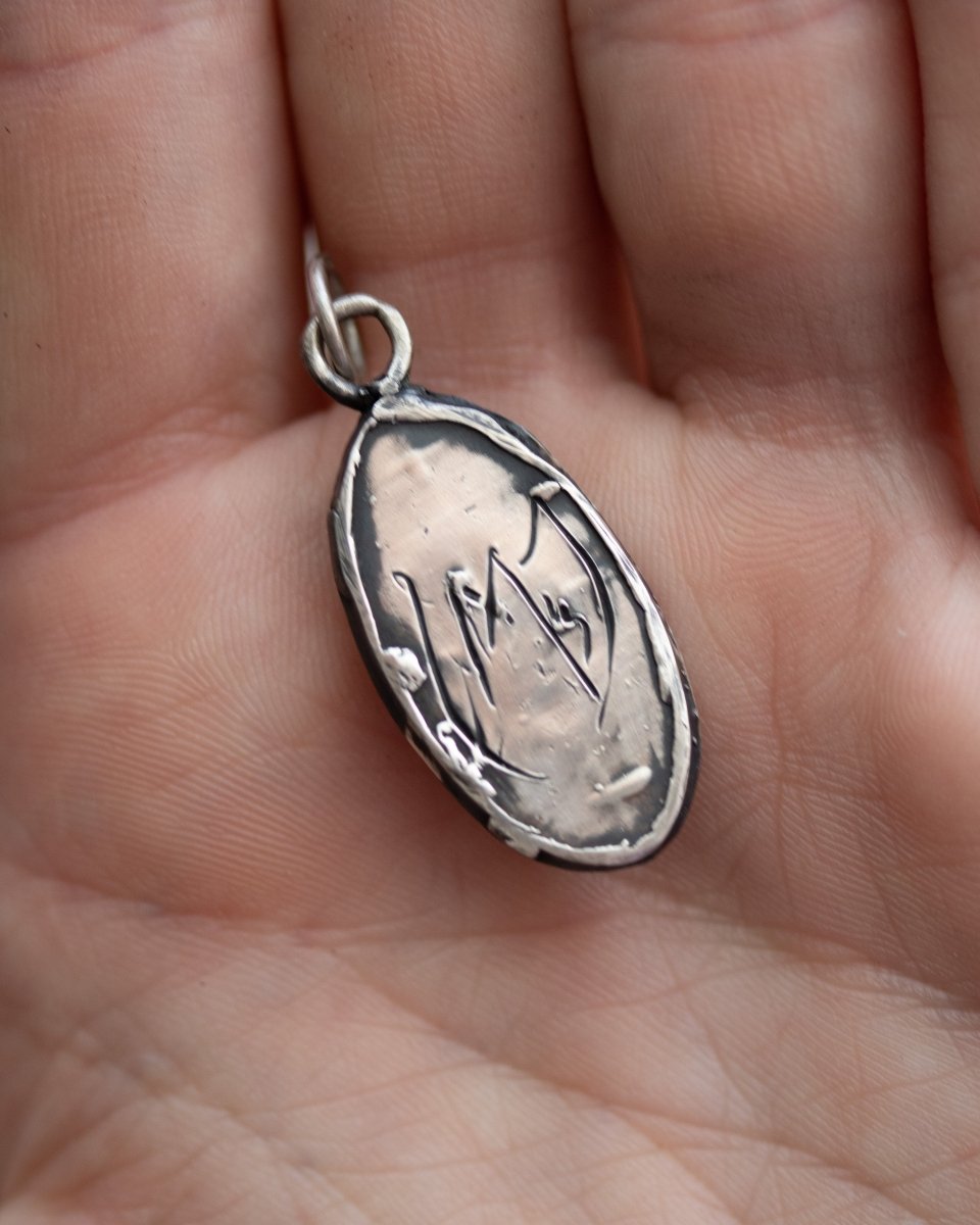 Nordic Talisman Rose - Cut Garnet Amulet: A Gateway to Ancestral Power and Elegance - Machinations