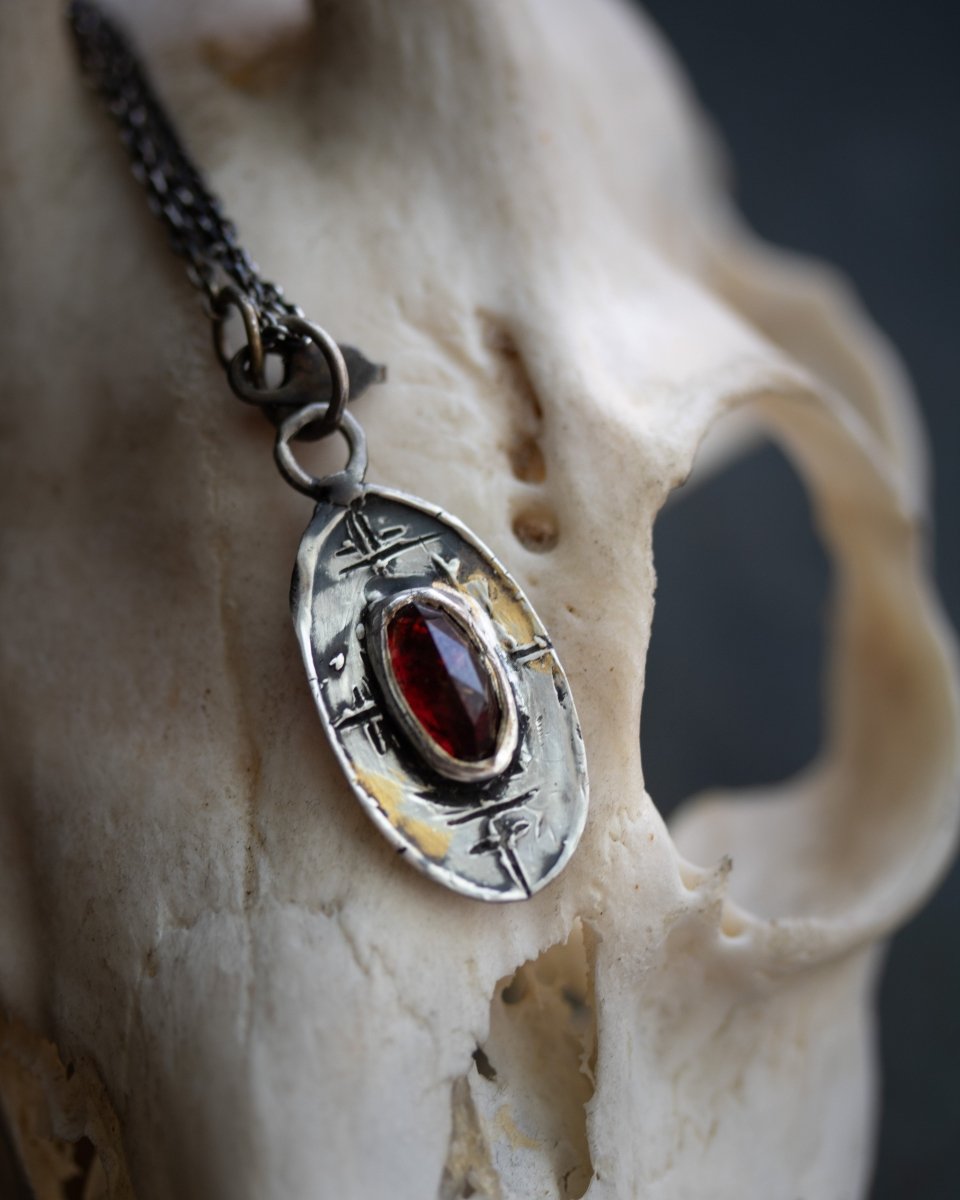 Nordic Talisman Rose - Cut Garnet Amulet: A Gateway to Ancestral Power and Elegance - Machinations