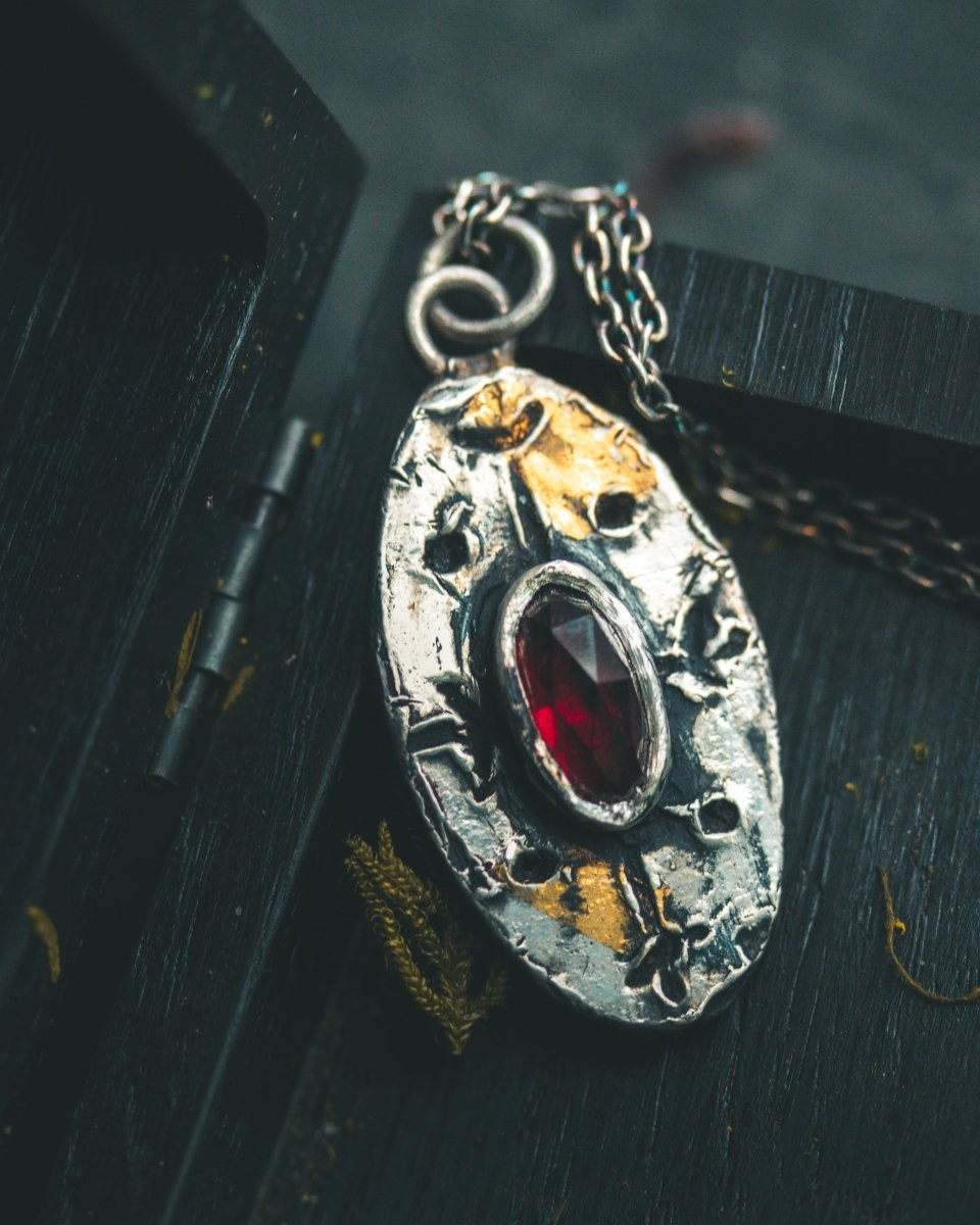 Nordic Talisman Rose - Cut Garnet Amulet: A Gateway to Ancestral Power and Warrior's Fire - Machinations