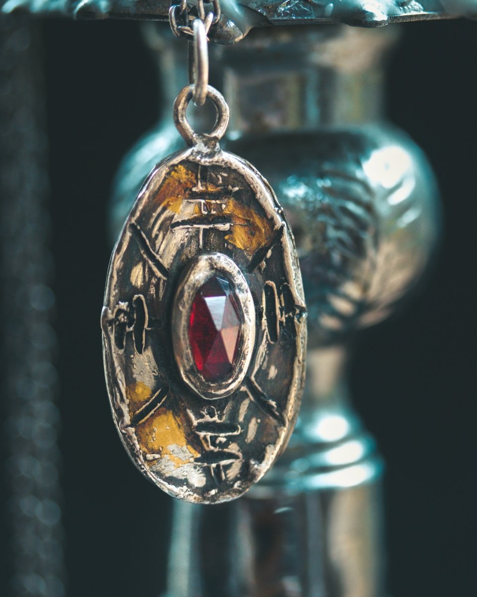 Nordic Talisman Rose - Cut Garnet Amulet: A Gateway to Ancestral Power and Warrior's Fire - Machinations