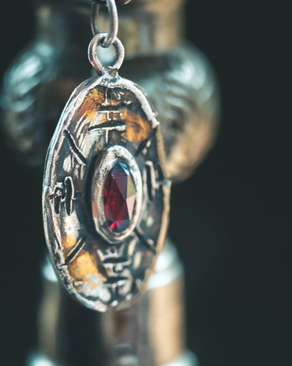 Nordic Talisman Rose - Cut Garnet Amulet: A Gateway to Ancestral Power and Warrior's Fire - Machinations