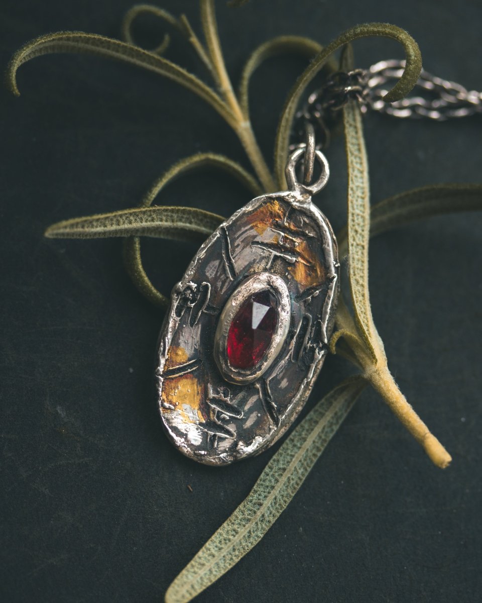 Nordic Talisman Rose - Cut Garnet Amulet: A Gateway to Ancestral Power and Warrior's Fire - Machinations