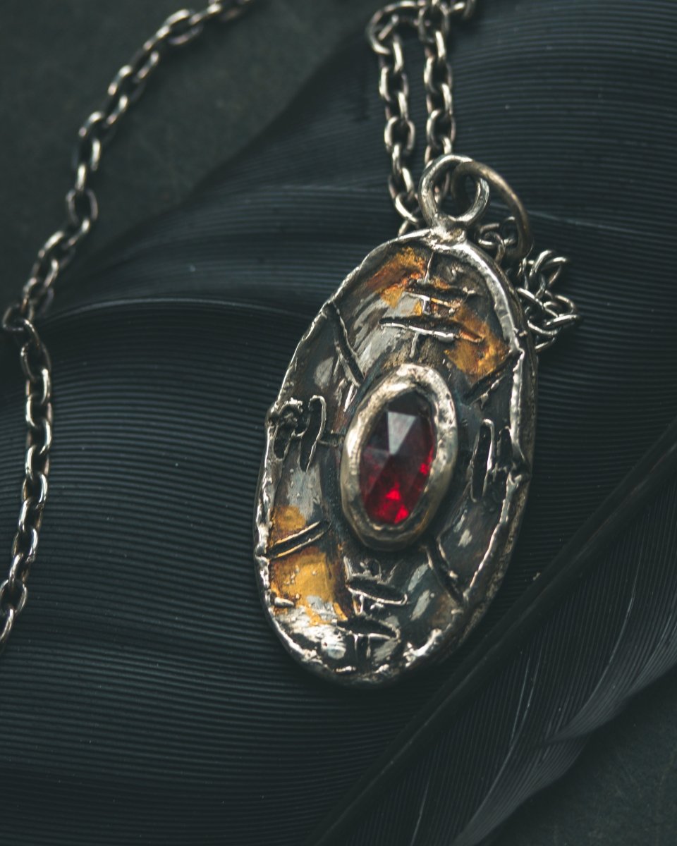 Nordic Talisman Rose - Cut Garnet Amulet: A Gateway to Ancestral Power and Warrior's Fire - Machinations