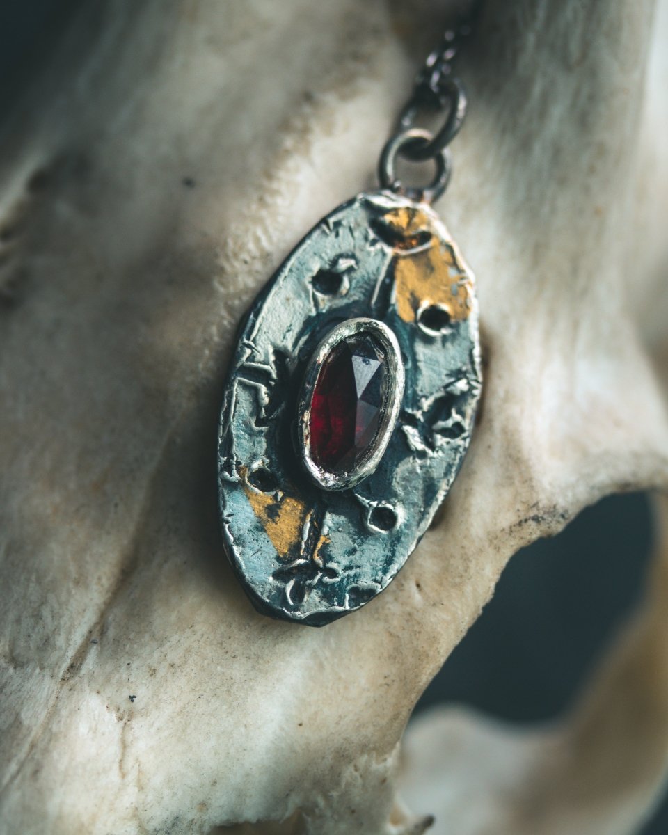 Nordic Talisman Rose - Cut Garnet Amulet: A Gateway to Ancestral Power and Warrior's Fire - Machinations