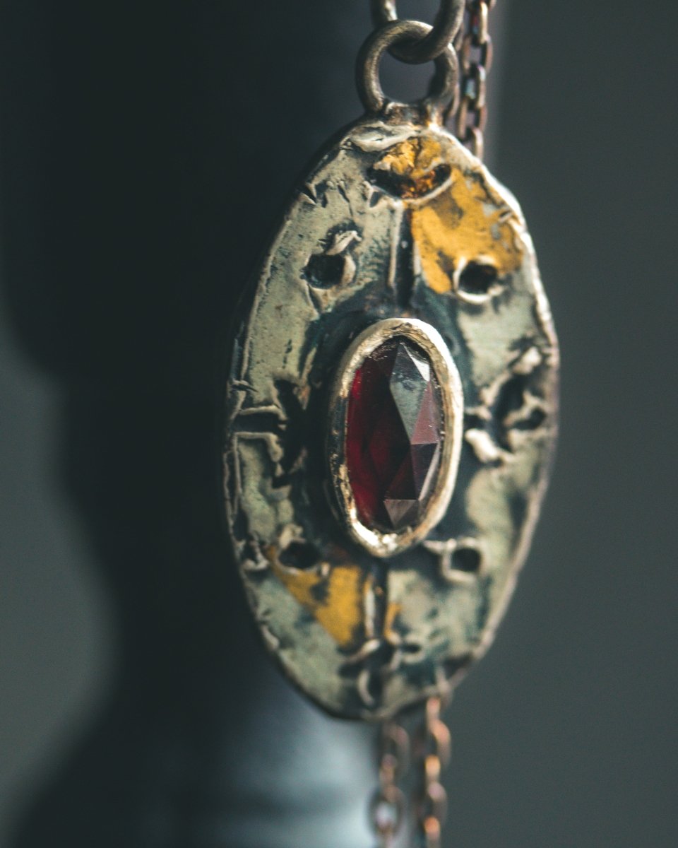 Nordic Talisman Rose - Cut Garnet Amulet: A Gateway to Ancestral Power and Warrior's Fire - Machinations