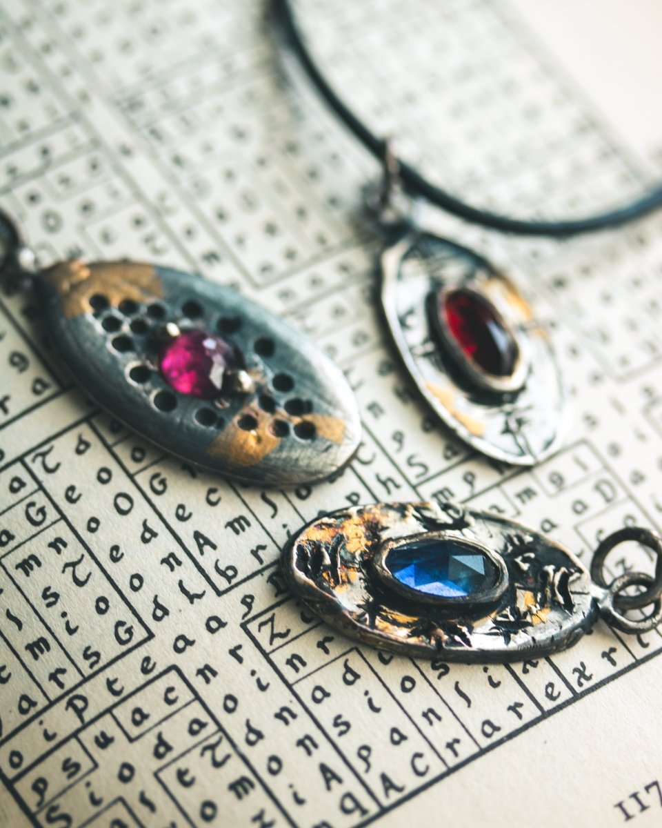 Nordic Talisman Rose - Cut Rhodolite Garnet Amulet: A Fusion of Ancestral Power and Modern Elegance - Machinations