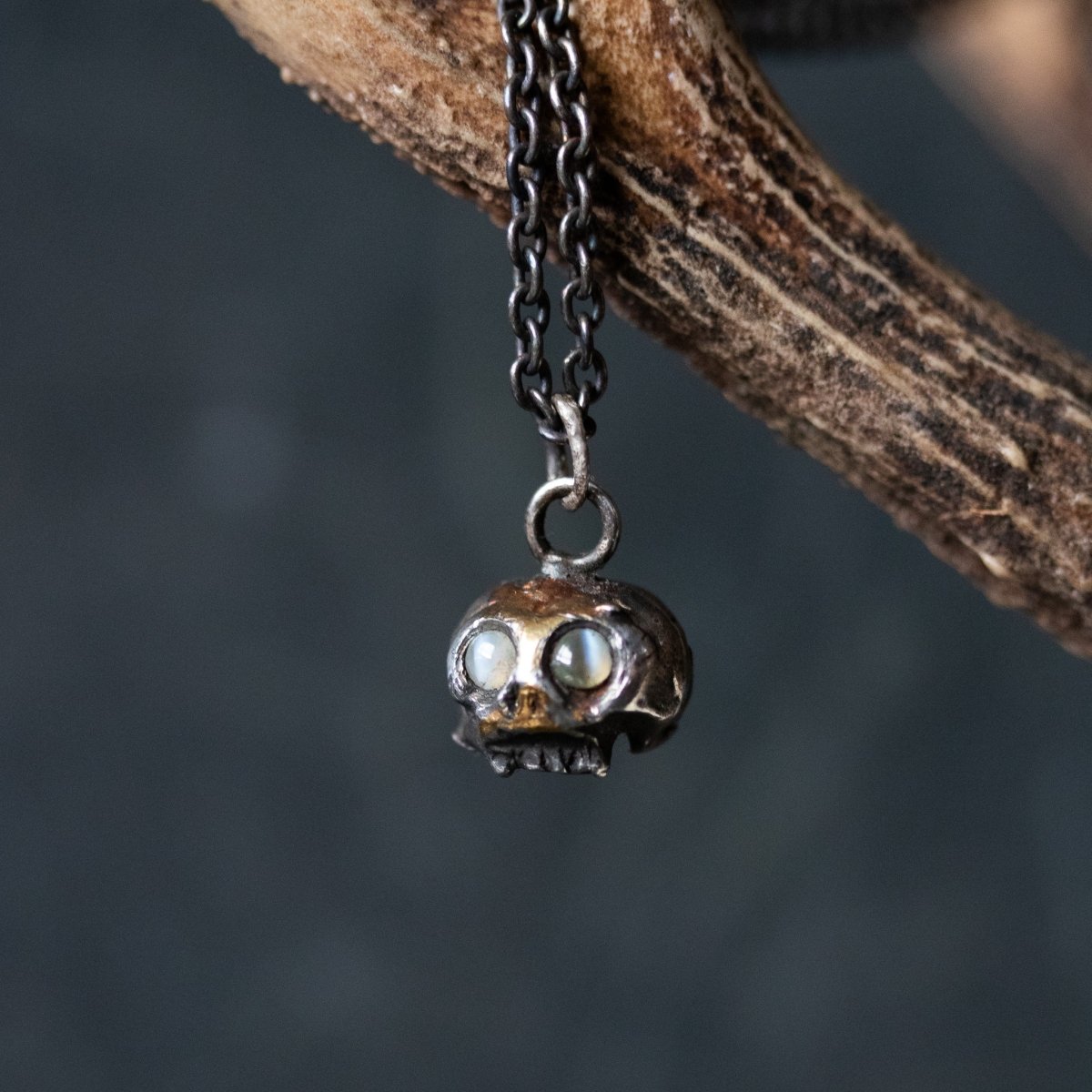Skull Charm with Chrysoberyl Cat's Eye: Embrace the Duality of Life and Death - Machinations