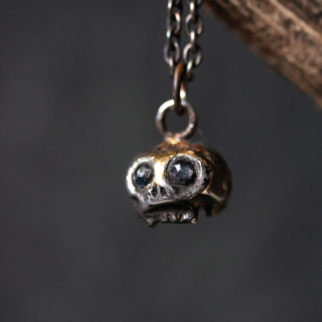 Skull charm with Moonstone eyes - Machinations