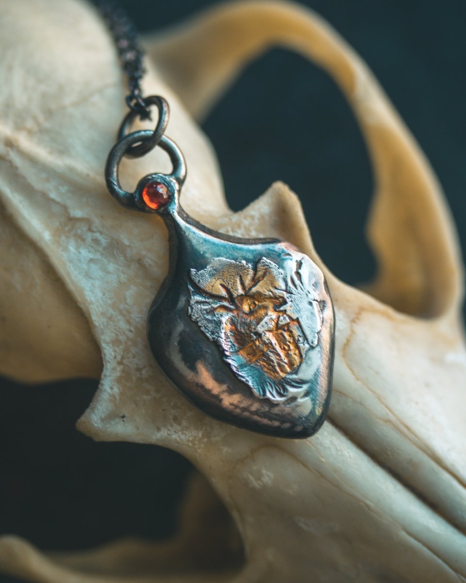 The Stag Pendant with Garnet: A Symbol of Spiritual Authority and Strength - Machinations