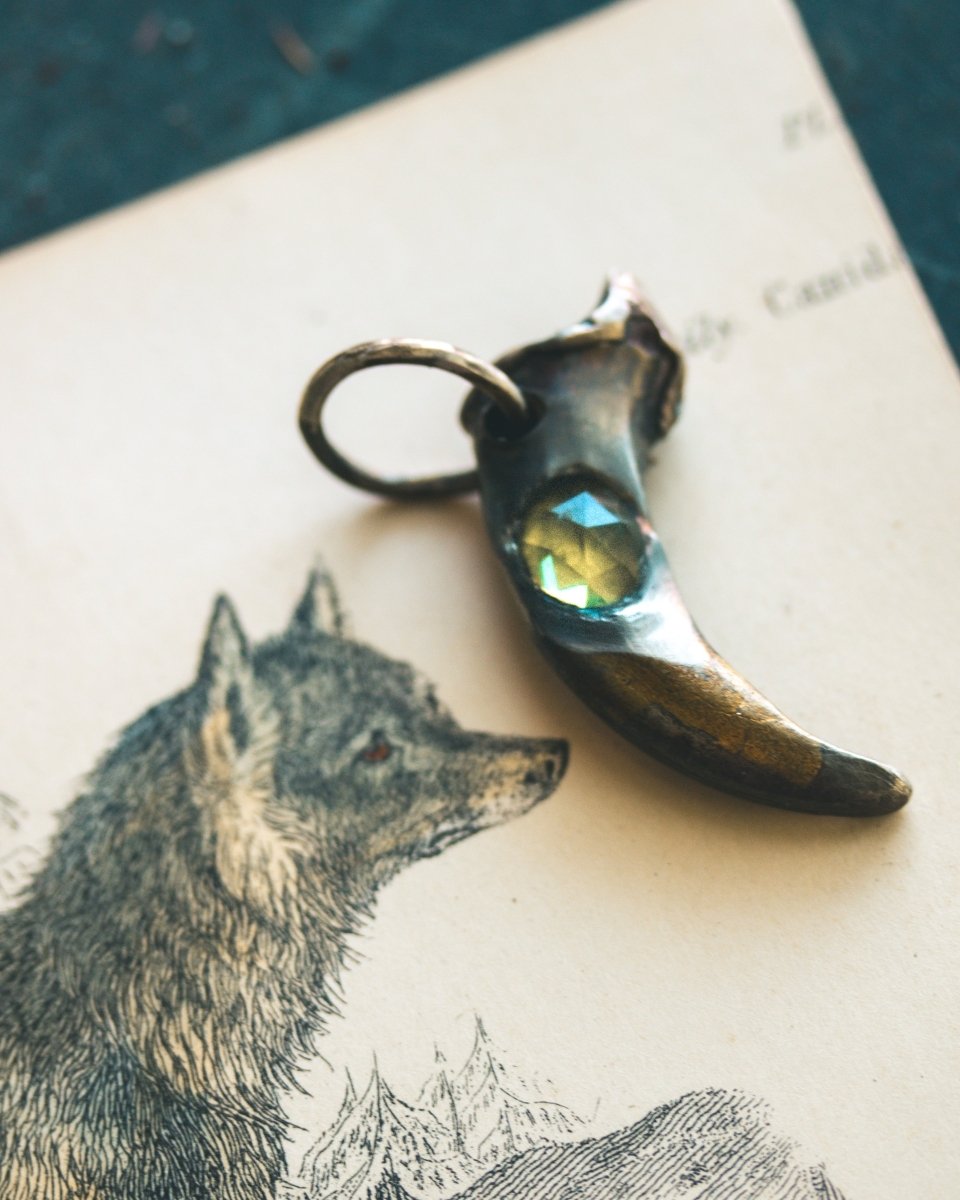 Wolf Claw Pendant with Peridot: Symbol of Guardianship, Renewal, and Spiritual Growth - Machinations