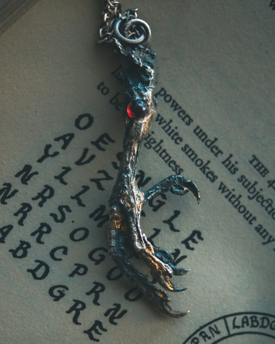 Yaga's Cabinet: Mourning Dove Divination Pendant | Sterling Silver | Almandine Garnet | Ethically Found - Machinations