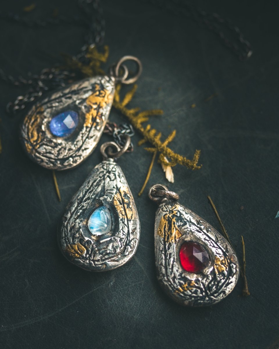 Yaga's Cabinet: Wheat & Flame Talisman - Sterling Silver | 23.5K Keum - boo Gold | Rose - Cut Garnet - Machinations
